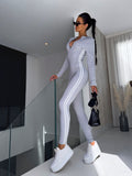 Amra – Stylischer Jumpsuit mit Frontreißverschluss und eleganter Passform für jeden Tag