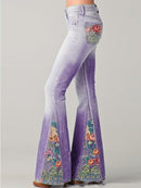 Flavia - Modische Glockenhose mit Blumendruck und Taschen