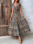 Clara – Maxikleid Mit Lebhaftem Print Und Kurzen Ärmeln