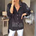 Lila – Lässige Bluse mit Knöpfen und Dreiviertelärmeln