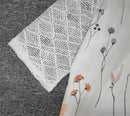 Mia – Stilvolles Top Mit Blumenmuster Und V Ausschnitt