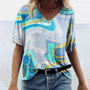 Jamie – Bunte Bluse mit kurzen Ärmeln und V-Ausschnitt für einen lässigen Stil