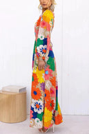 Maia – Maxikleid mit Blumenprint, ausgeschnittener Taille und langen Ärmeln