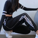 Emma – Lässige Hohe Taille Jogginghose mit Seitenstreifen und Taschen