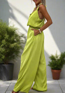 Leona – Ärmelloser Jumpsuit mit weitem Bein rückenfreier Passform und verstellbaren Trägern