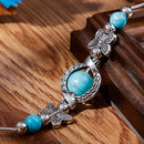 Milla – Verstellbares Schmetterlings Charm Armband mit einzigartigen Perlen