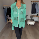 Lila – Lässige Bluse mit Knöpfen und Dreiviertelärmeln