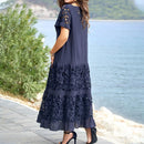 Emma – Elegantes Blumenkleid mit kurzen Ärmeln und Rüschenakzenten