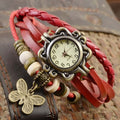 Hannah – Mehrschichtige Armbanduhr mit Schmetterlingsdesign und analogem Zifferblatt