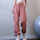 Emma – Lässige Hohe Taille Jogginghose mit Seitenstreifen und Taschen