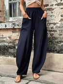 Hannah – Locker geschnittene lange Hose mit elastischem Bund und Taschen