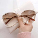 Eliana – Modische Cat-Eye-Sonnenbrille mit dunklen Gläsern und UV-Schutz