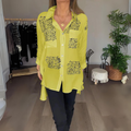 Lila – Lässige Bluse mit Knöpfen und Dreiviertelärmeln
