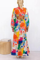 Maia – Maxikleid mit Blumenprint, ausgeschnittener Taille und langen Ärmeln