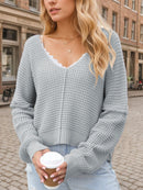 Lira – Oversized Off-Shoulder-Bluse mit tiefem V-Ausschnitt