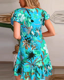 Aria – Entspanntes Blumenkleid mit Rüschensaum und V-Ausschnitt