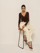 Laura – Stylisches Langarm Top mit tiefem V Ausschnitt