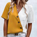 Lunara – Bluse mit seitlichen Knöpfen mit Brusttasche und einzigartigem Design