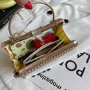 Sorina – Kleine Clutch Tasche mit geometrischem Muster