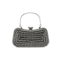 Sorina – Kleine Clutch Tasche mit geometrischem Muster