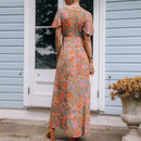 Samira – Maxikleid mit Flatterärmeln und durchgehendem Blumenmuster