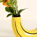FormaBana – Dekorative Vase in Bananenform mit geschwungener Silhouette