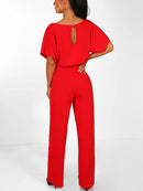 Zareen – Lässiger langer Jumpsuit mit Rüschengürtel kurzen Ärmeln und geradem Bein