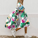 Naya – Elegantes fließendes Kleid mit halb Ärmeln und verspielten Drucken