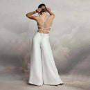 Alina – Eleganter rückenfreier Jumpsuit mit V Ausschnitt und Spaghettiträgern