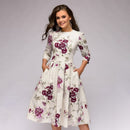 Tania - Lässiges mittellanges Kleid mit Rundhalsausschnitt Blumendruck und Taschen