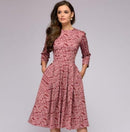 Tania - Lässiges mittellanges Kleid mit Rundhalsausschnitt Blumendruck und Taschen