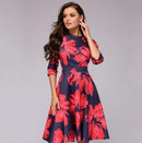 Tania - Lässiges mittellanges Kleid mit Rundhalsausschnitt Blumendruck und Taschen