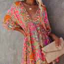 Luna – Boho Minikleid mit tiefem Ausschnitt und verspielten Ärmeln