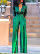 Anna - Eleganter tiefem V-Ausschnitt Jumpsuit mit langen Ärmeln und weitem Bein