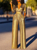 Anna - Eleganter tiefem V-Ausschnitt Jumpsuit mit langen Ärmeln und weitem Bein