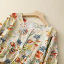 Raya – Bluse mit floralem Patchwork-Muster, lockerer Passform und weitem Schnitt