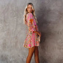 Luna – Boho Minikleid mit tiefem Ausschnitt und verspielten Ärmeln