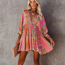 Luna – Boho Minikleid mit tiefem Ausschnitt und verspielten Ärmeln