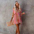 Luna – Boho Minikleid mit tiefem Ausschnitt und verspielten Ärmeln