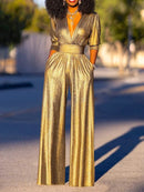 Anna - Eleganter tiefem V-Ausschnitt Jumpsuit mit langen Ärmeln und weitem Bein