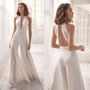 Emma - Luxuriöser Jumpsuit mit tiefem V Ausschnitt und geteiltem weitem Bein