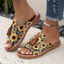 Aria – Schicke Blumen Sandalen mit Quastendetail