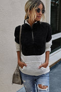 Luna – Entspannter Pullover mit halbem Reißverschluss und funktioneller Fronttasche