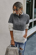 Luna – Entspannter Pullover mit halbem Reißverschluss und funktioneller Fronttasche