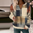 Emilia - Geometrischer Pullover mit halbem Reißverschluss langen Ärmeln und lockerer Passform