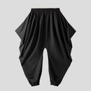 Kian – Weite drapierte Hose mit umgeschlagenem Saum und lockerer Passform