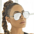 Isla – Stylische Sonnenbrille mit verspiegelten Gläsern und mutigem Rahmendesign