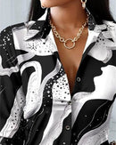 Noor – Modernes Top mit abstraktem Print und raffinierten Details