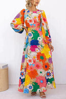 Maia – Maxikleid mit Blumenprint, ausgeschnittener Taille und langen Ärmeln