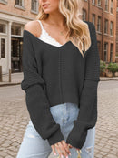 Lira – Oversized Off-Shoulder-Bluse mit tiefem V-Ausschnitt